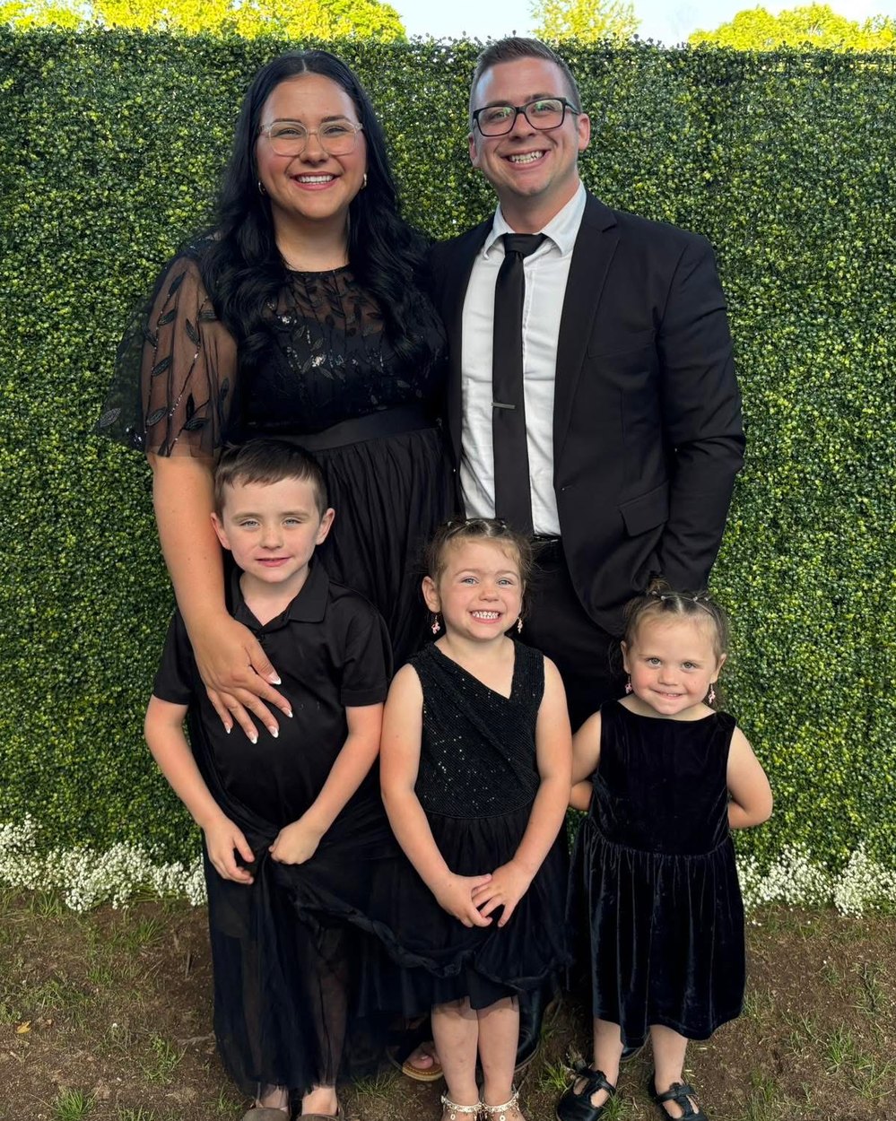 Aaron Tipton, founder of Tipton Web Design, with his wife and three children in Malvern, Arkansas
